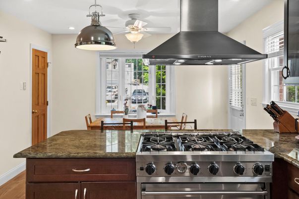 Dining room, Interior, Kitchen, Pendant Lights, Recessed Lighting, Stainless Steel Appliances, Wood Texture Flooring