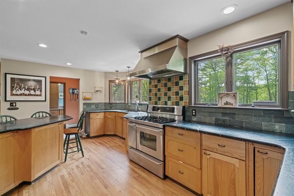 Interior, Kitchen, Pendant Lights, Recessed Lighting, Stainless Steel Appliances, Wood Texture Flooring