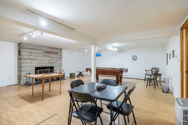 Billiard Table, Dining room, Fireplace, Game Room, Interior, Stone Walls, Wood Texture Flooring