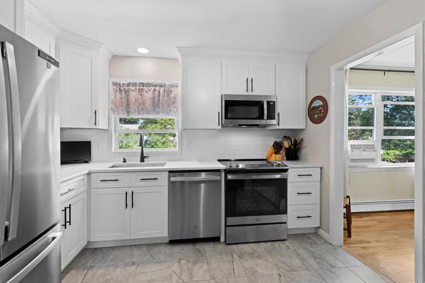 Interior, Kitchen, Recessed Lighting, Stainless Steel Appliances, Wood Texture Flooring