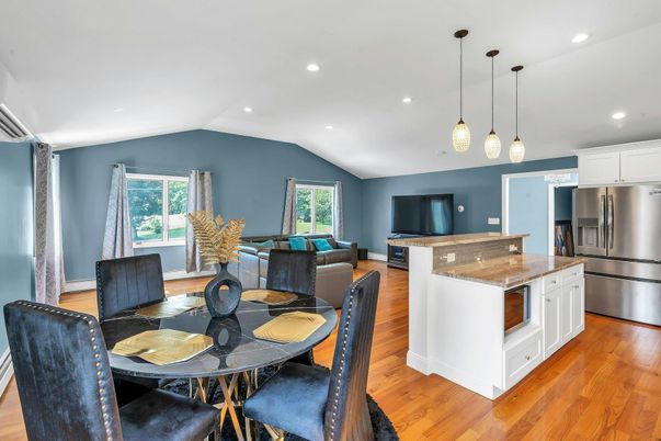 Dining room, Interior, Kitchen, Living room, Pendant Lights, Recessed Lighting, Stainless Steel Appliances, Wood Texture Flooring