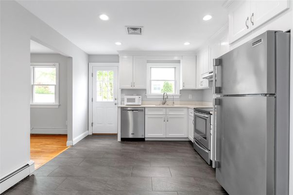 Interior, Kitchen, Recessed Lighting, Stainless Steel Appliances, Wood Texture Flooring