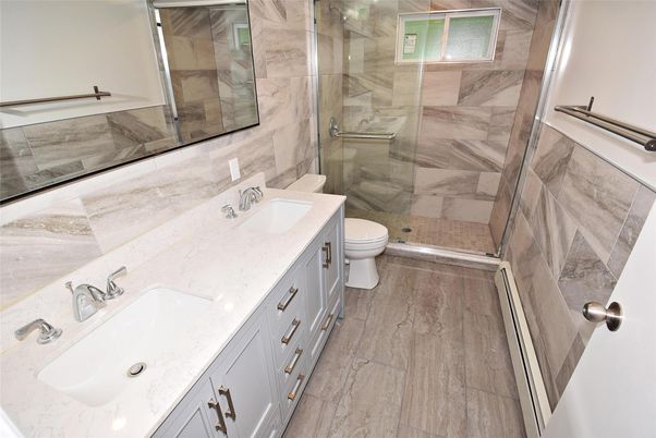 Bathroom, Dual Sink Vanities, Glass Shower, Interior, Marble Walls