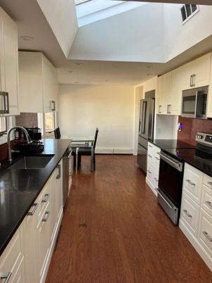 Dining room, Interior, Kitchen, Recessed Lighting, Stainless Steel Appliances, Wood Texture Flooring