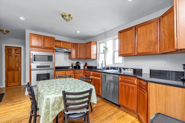 Dining room, Interior, Kitchen, Recessed Lighting, Stainless Steel Appliances, Wood Texture Flooring