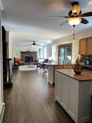 Fireplace, Interior, Kitchen, Living room, Recessed Lighting, Wood Texture Flooring