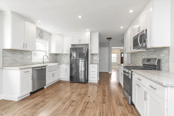 Interior, Kitchen, Recessed Lighting, Stainless Steel Appliances, Wood Texture Flooring