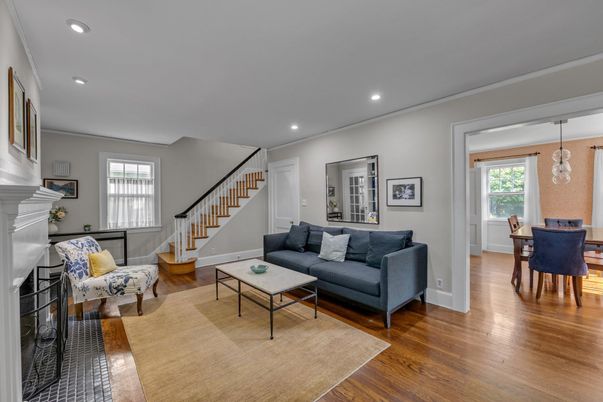 Dining room, Fireplace, Interior, Living room, Pendant Lights, Recessed Lighting, Wood Texture Flooring