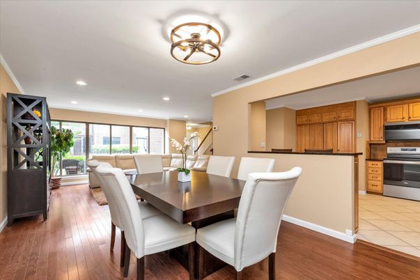 Dining room, Interior, Kitchen, Recessed Lighting, Stainless Steel Appliances, Wood Texture Flooring