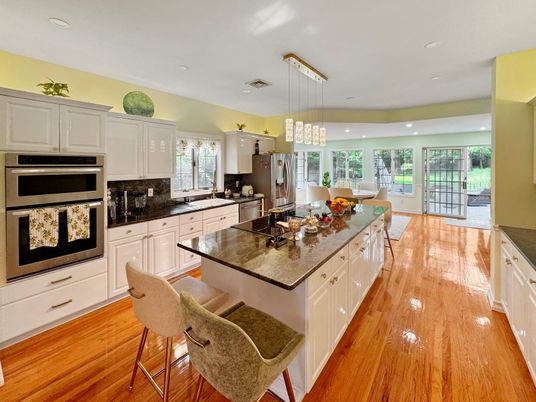 Dining room, Interior, Kitchen, Pendant Lights, Recessed Lighting, Stainless Steel Appliances, Wood Texture Flooring