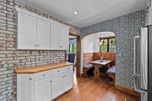 Dining room, Interior, Kitchen, Pendant Lights, Recessed Lighting, Stainless Steel Appliances, Stone Walls, Wood Texture Flooring