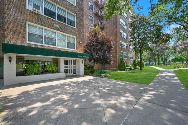 Exterior, Facade, Brick Facade, Condo Building