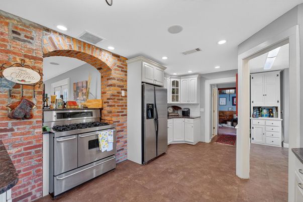 Interior, Kitchen, Recessed Lighting, Stainless Steel Appliances, Stone Walls