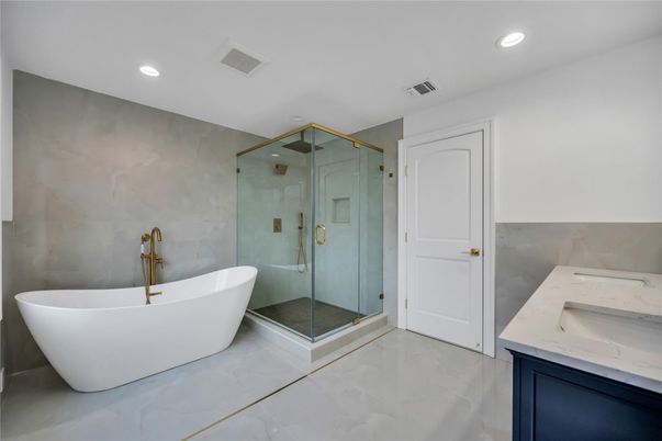 Bathroom, Dual Sink Vanities, Free Standing Baths, Glass Shower, Interior, Marble, Recessed Lighting