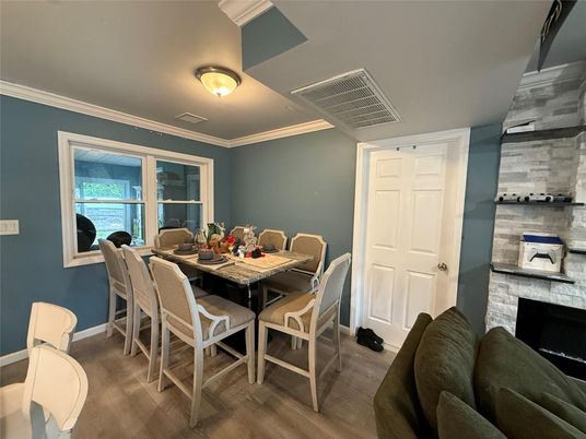 Dining room, Fireplace, Interior, Wood Texture Flooring