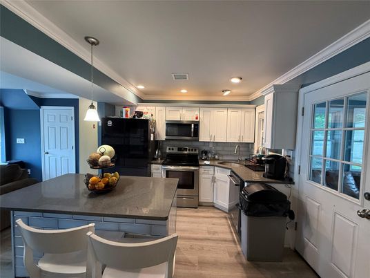 Interior, Kitchen, Pendant Lights, Recessed Lighting, Stainless Steel Appliances, Wood Texture Flooring