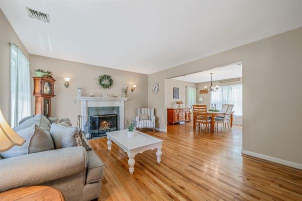 Chandelier, Dining room, Fireplace, Interior, Living room, Pendant Lights, Wood Texture Flooring