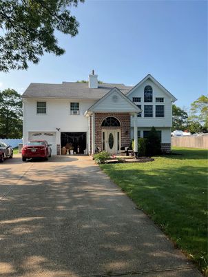 Attached, Exterior, Facade, Brick Facade, Raised Ranch
