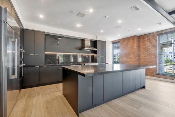 Interior, Kitchen, Recessed Lighting, Stainless Steel Appliances, Stone Walls, Wood Texture Flooring