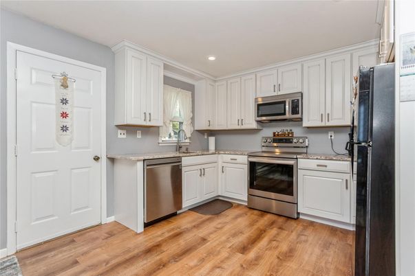 Interior, Kitchen, Recessed Lighting, Stainless Steel Appliances, Wood Texture Flooring