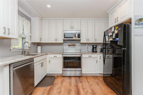 Interior, Kitchen, Recessed Lighting, Stainless Steel Appliances, Wood Texture Flooring