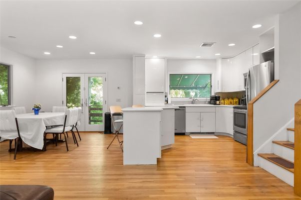 Dining room, Interior, Kitchen, Recessed Lighting, Stainless Steel Appliances, Wood Texture Flooring