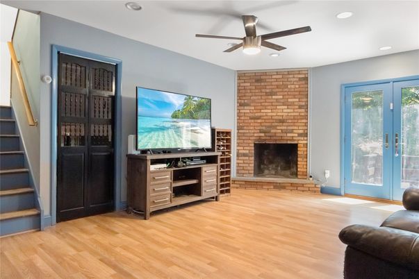 Fireplace, Interior, Recessed Lighting, Stone Walls, Wood Texture Flooring