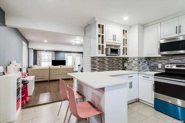 Interior, Kitchen, Living room, Recessed Lighting, Stainless Steel Appliances, Wood Texture Flooring