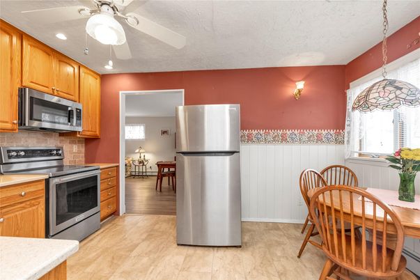 Dining room, Interior, Kitchen, Recessed Lighting, Stainless Steel Appliances, Wood Texture Flooring