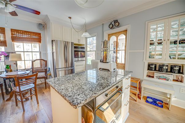 Dining room, Interior, Kitchen, Pendant Lights, Stainless Steel Appliances, Wood Texture Flooring