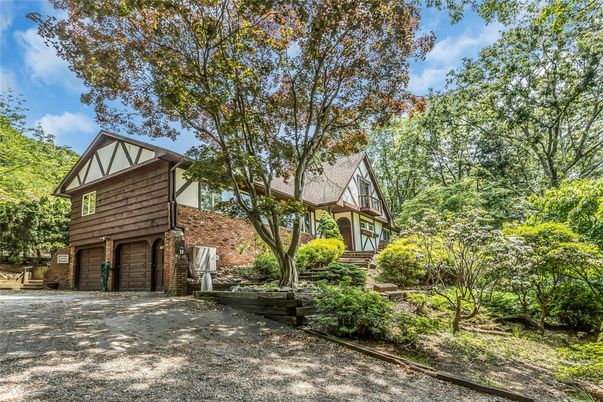 Attached, Backyard, Exterior, Facade, Brick Facade, Tudor Revival