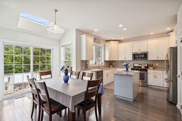 Dining room, Interior, Kitchen, Pendant Lights, Recessed Lighting, Stainless Steel Appliances, Wood Texture Flooring