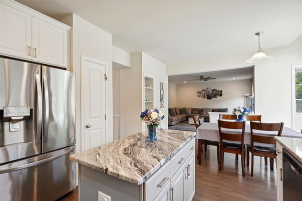 Dining room, Interior, Kitchen, Pendant Lights, Recessed Lighting, Stainless Steel Appliances, Wood Texture Flooring