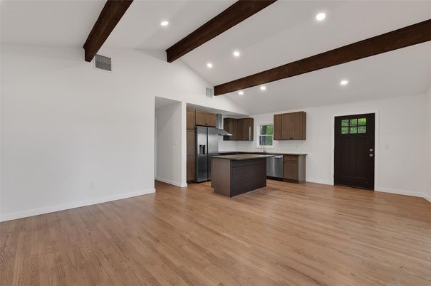 Empty room, Interior, Kitchen, Recessed Lighting, Stainless Steel Appliances, Wooden Beams, Wood Texture Flooring