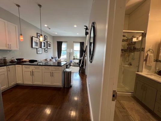 Bathroom, Dining room, Glass Shower, Interior, Kitchen, Pendant Lights, Recessed Lighting, Wood Texture Flooring