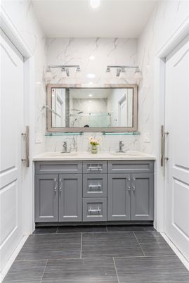 Bathroom, Dual Sink Vanities, Interior, Marble Walls, Recessed Lighting