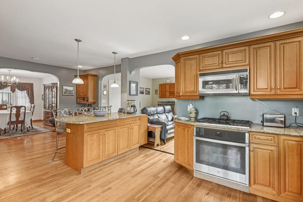 Chandelier, Dining room, Interior, Kitchen, Living room, Pendant Lights, Recessed Lighting, Wood Texture Flooring