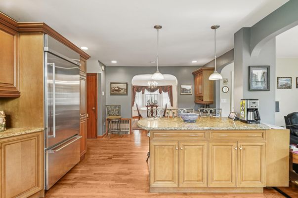 Dining room, Interior, Kitchen, Pendant Lights, Recessed Lighting, Stainless Steel Appliances, Wood Texture Flooring