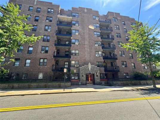 Exterior, Facade, Brick Facade, Condo Building