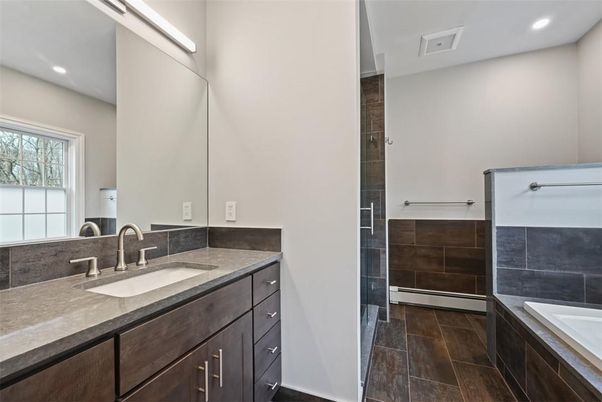 Bathroom, Dual Sink Vanities, Interior, Recessed Lighting, Wood Texture Flooring