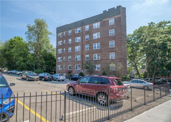Exterior, Facade, Brick Facade, Condo Building