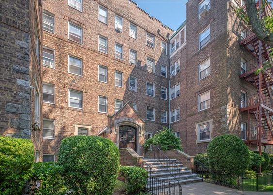 Exterior, Facade, Brick Facade, Condo Building