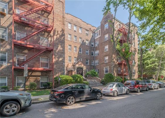 Exterior, Facade, Brick Facade, Condo Building