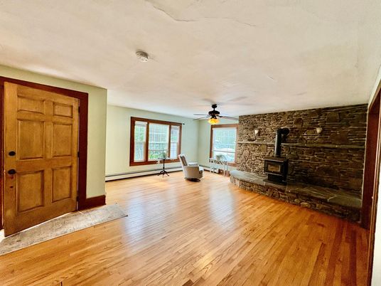 Empty room, Fireplace, Interior, Stone Walls, Wood Texture Flooring