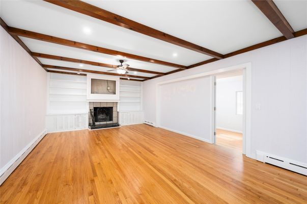Empty room, Fireplace, Interior, Recessed Lighting, Wooden Beams, Wood Texture Flooring
