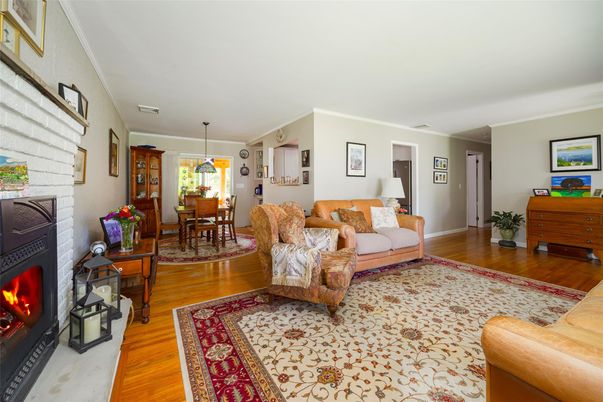 Dining room, Fireplace, Interior, Living room, Pendant Lights, Wood Texture Flooring