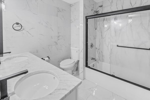 Bathroom, Dual Sink Vanities, Glass Shower, Interior, Marble, Marble Walls