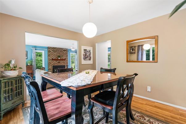 Dining room, Fireplace, Interior, Pendant Lights, Stone Walls, Wood Texture Flooring