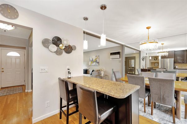 Chandelier, Dining room, Interior, Kitchen, Pendant Lights, Stainless Steel Appliances, Wood Texture Flooring