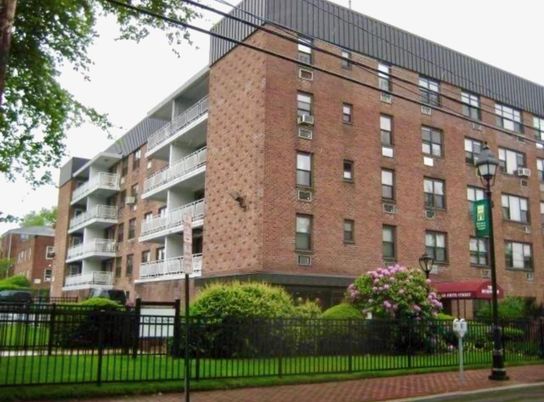 Exterior, Facade, Brick Facade, Condo Building